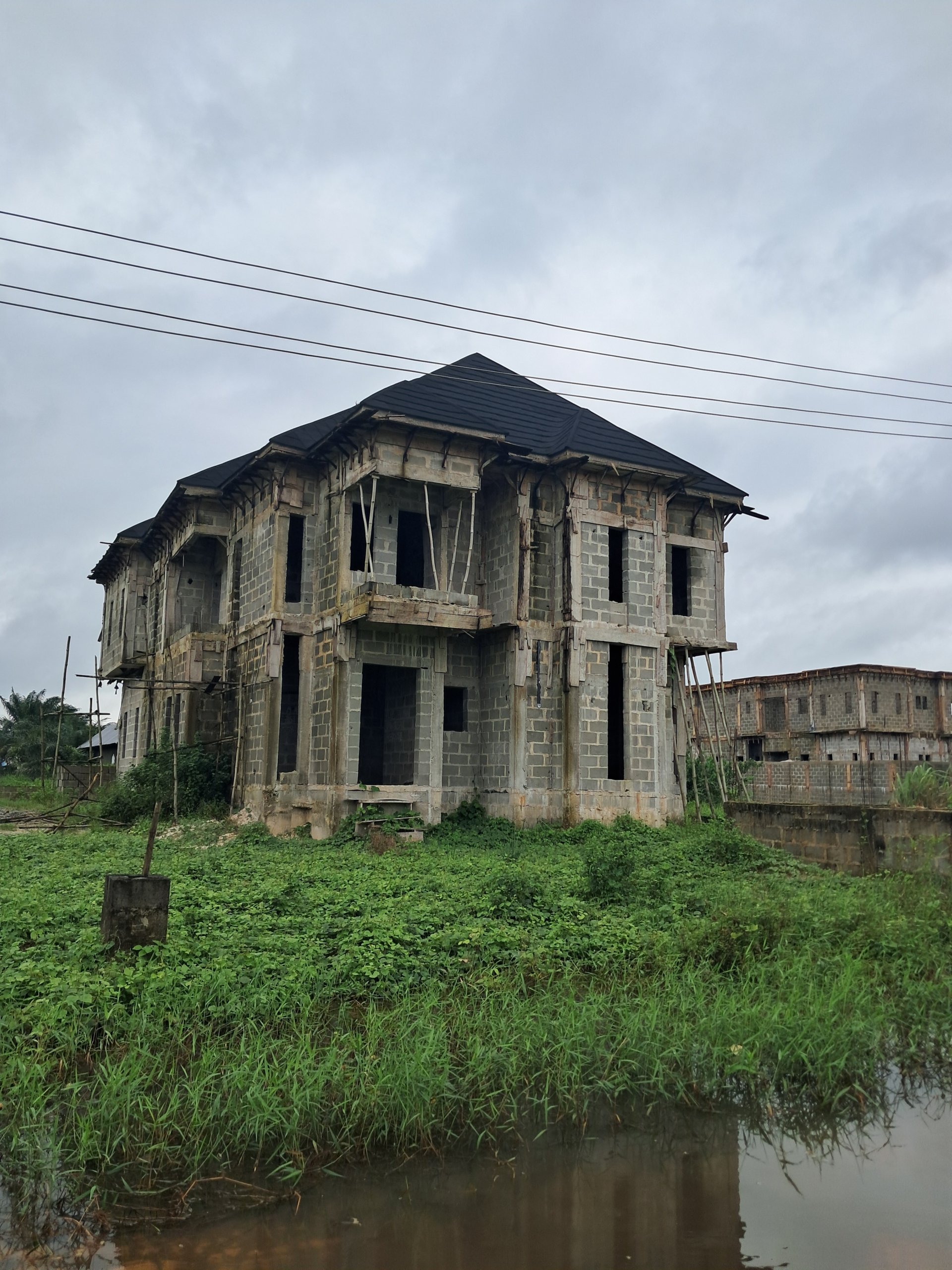 4 bedroom duplex carcass for sale at Army estate, Effurun